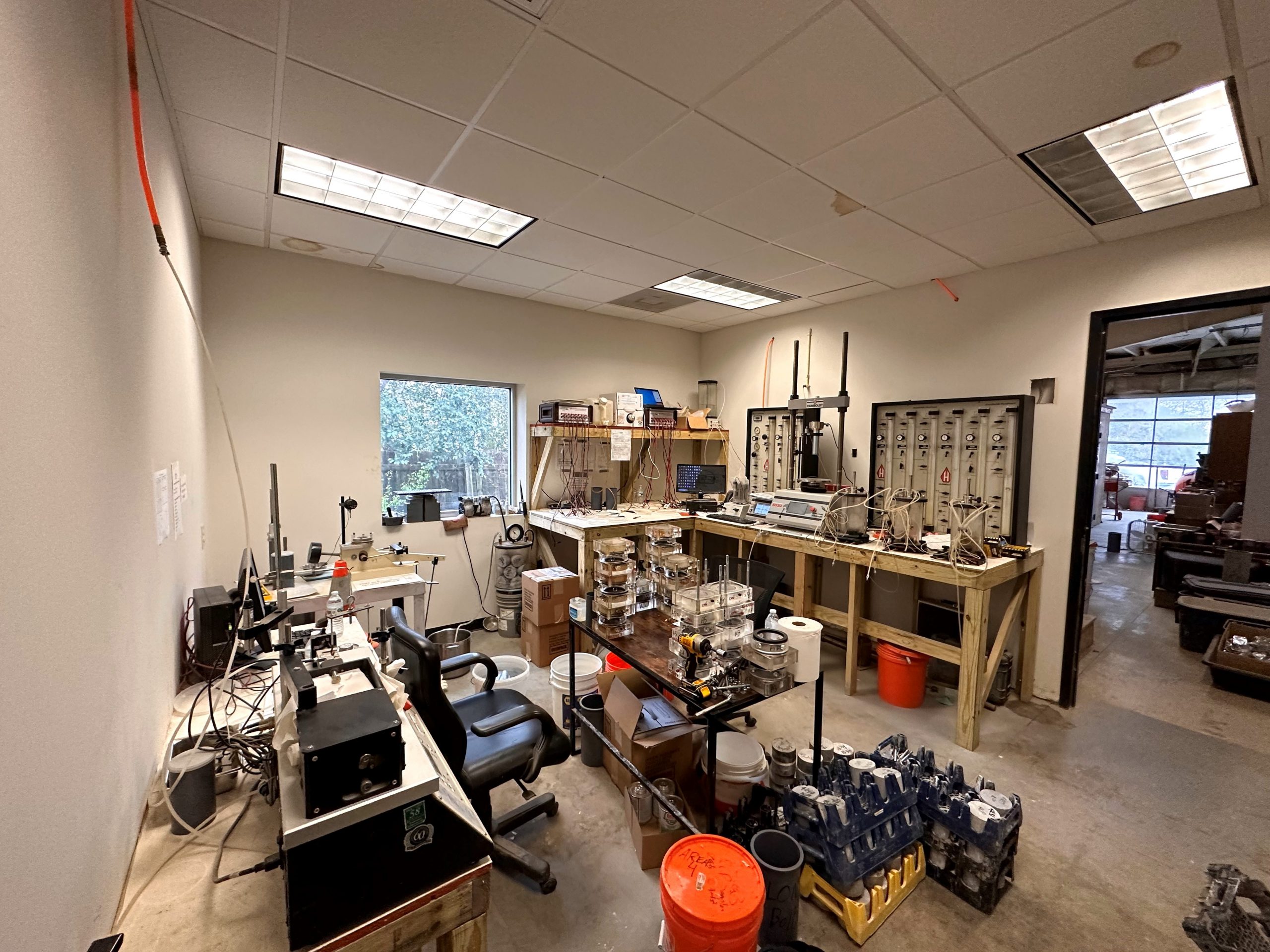 AASHTO-accredited materials testing laboratory with soils and concrete testing equipment